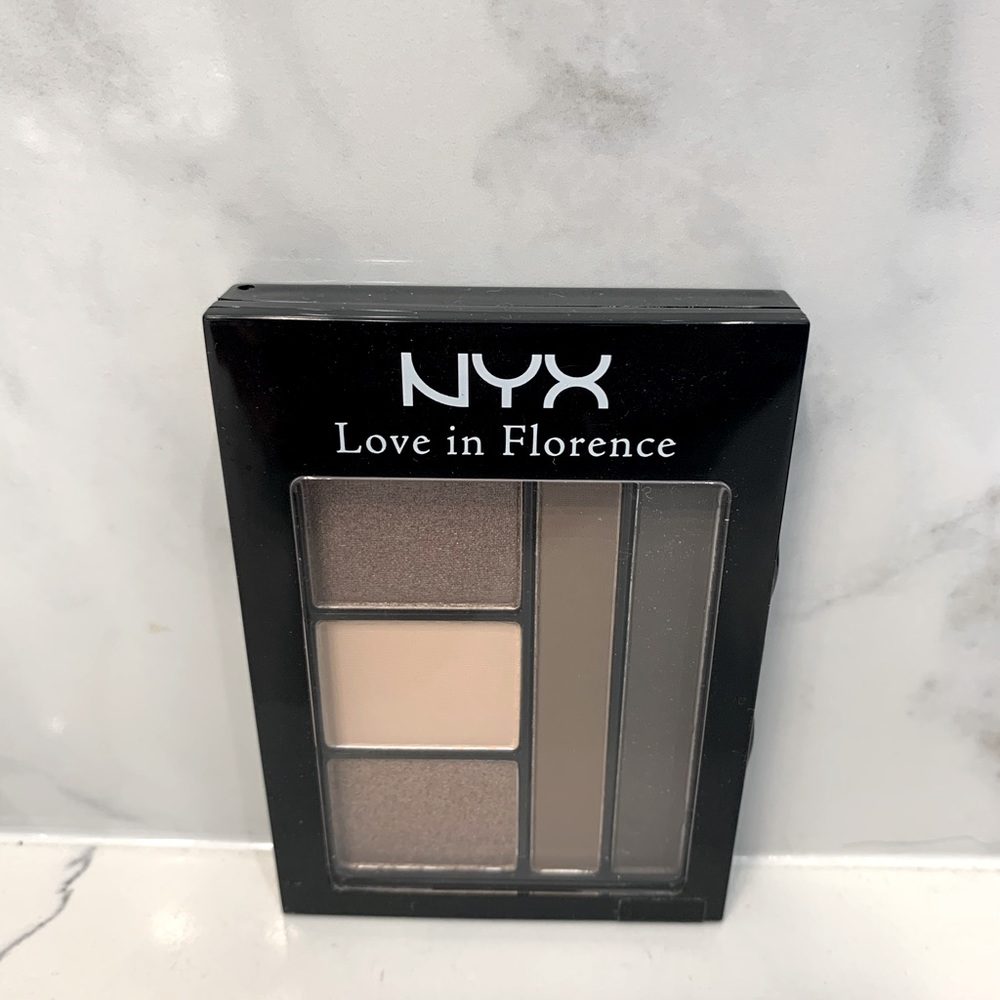 NYX “Love In Florence” eyeshadow palette.  “Merry My Romeo” Disc shades.